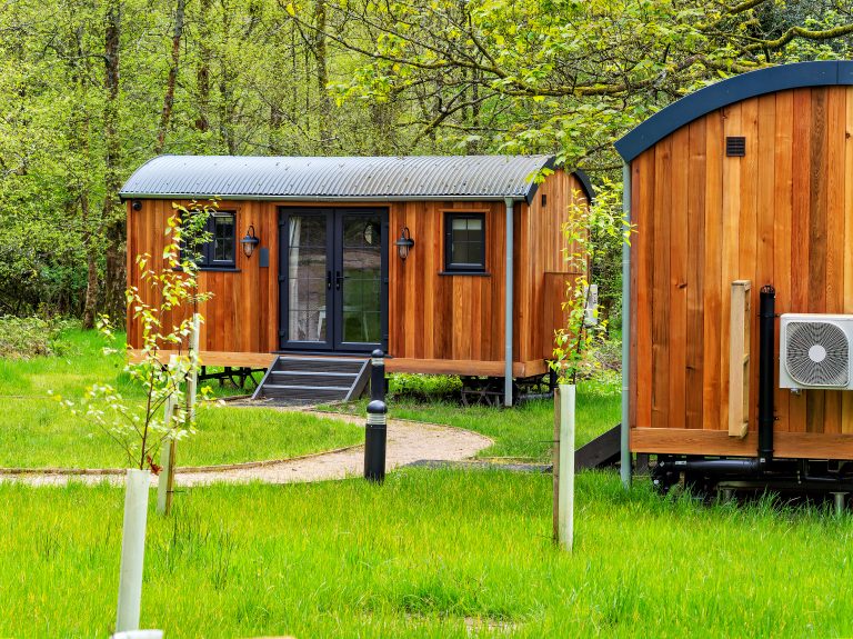 Tiny wooden homes and cabins in a rural setting